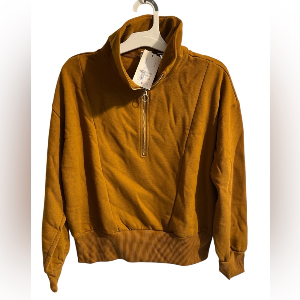 A New Day rust colored quarter zip!